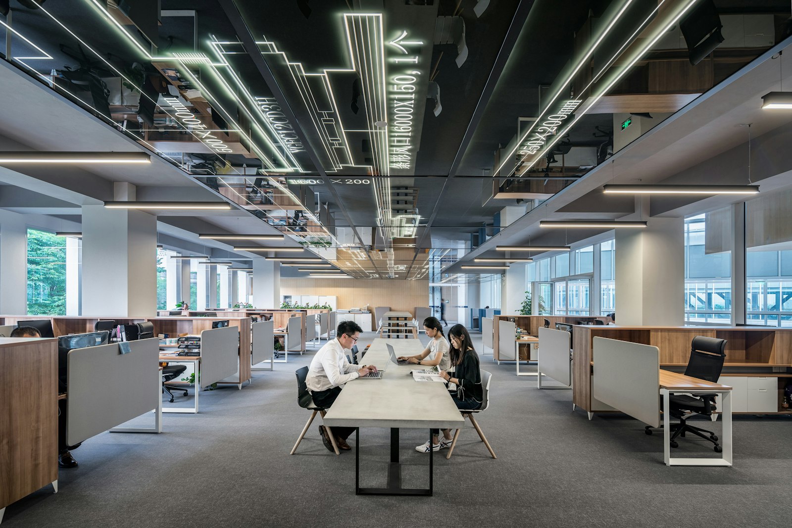 Open plan office with teams working across departments