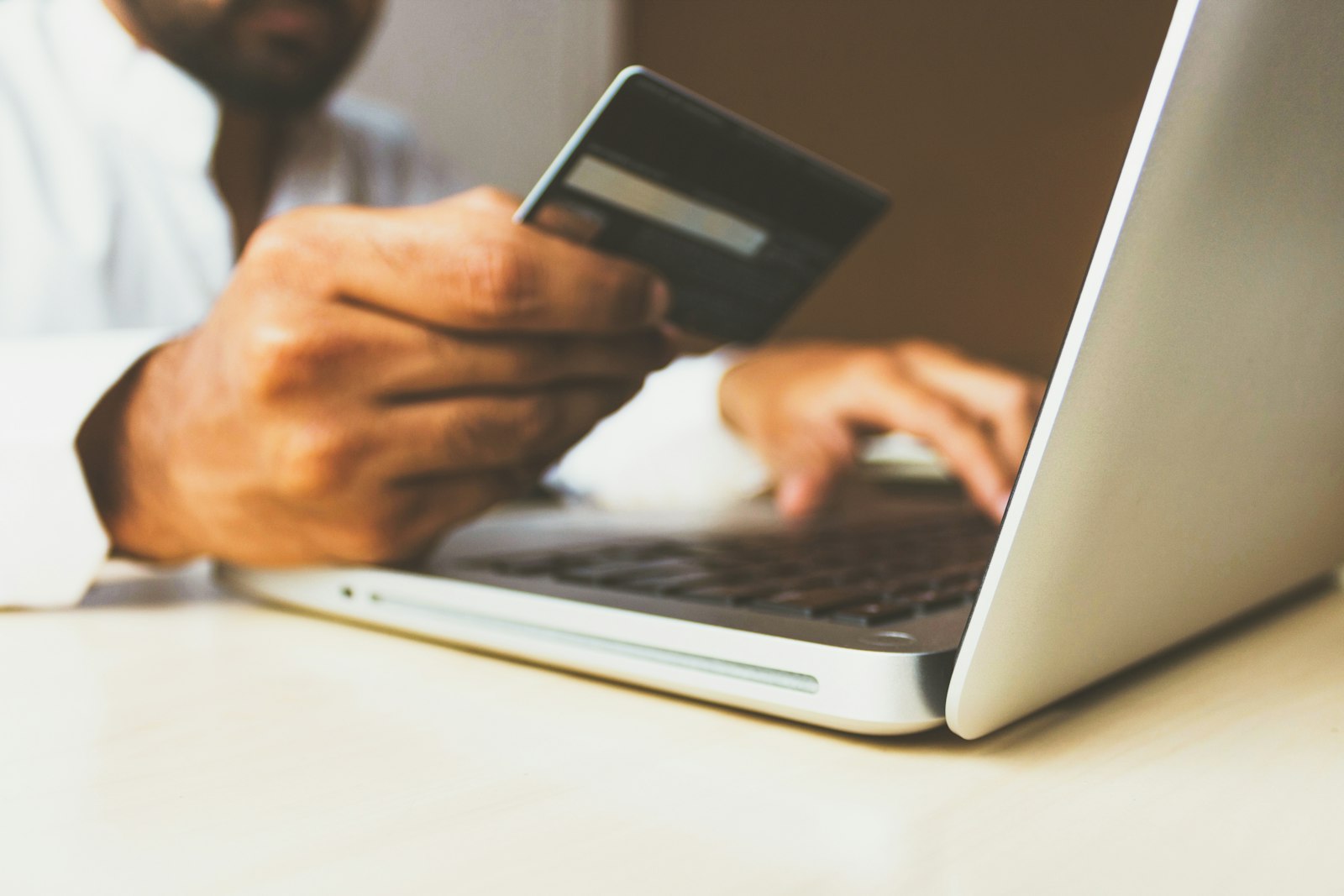 Borrower completing a digital loan repayment on a laptop